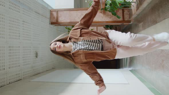 Woman Student Practices HipHop Dancing