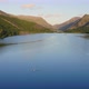 Kayaker Kayaking on a Lake in the Mountains of Wales - VideoHive Item for Sale
