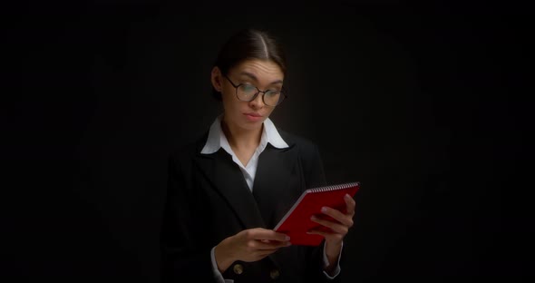 Brunette in Office Clothes Likes a Document and She Gives a Thumbs Up