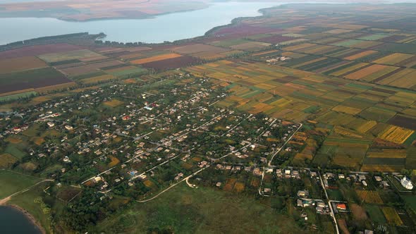 Aerial drone view of the Duruitoarea natural reservation in Moldova. River and fog in the air, hills alt
