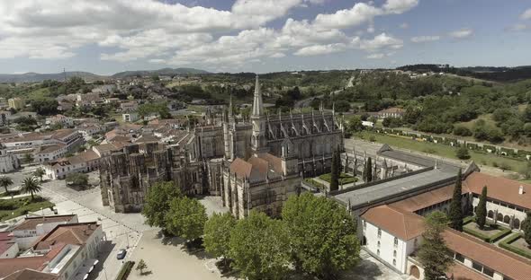 The Batalha Monastery And The Unfinished Chapels On A Sunny Summer Day In Batalha, Leiria, Portugal. alt