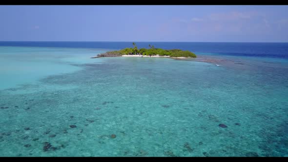 Aerial top down nature of exotic resort beach lifestyle by blue green sea with white sandy backgroun alt