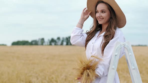 Free Girl Run Across the Wheat Field in the Park