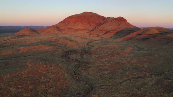Summit of Mt Bruce, Karijini National Park, Western Australia Sunrise Sunset 4K Aerial Drone