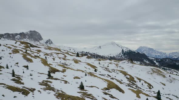 Aerial, Winter Landscape In Dolomites Mountains On A Cloudy Day In Italy