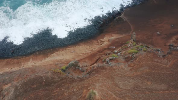 Man Walking Down on Road to Ocean at Capelinhos Volcano Faial Island Azores alt