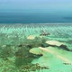 Turquoise Lagoon with Coral Reef and Water Villa - VideoHive Item for Sale