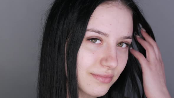 Young Beautiful Woman Model Posing in Front of the Camera alt