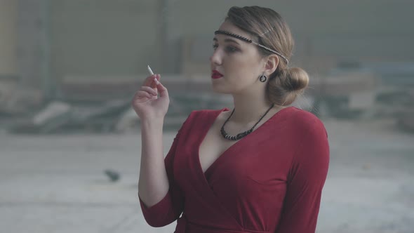 Portrait Confident Young Woman in Old Style Cloth Fire the Cigarette alt