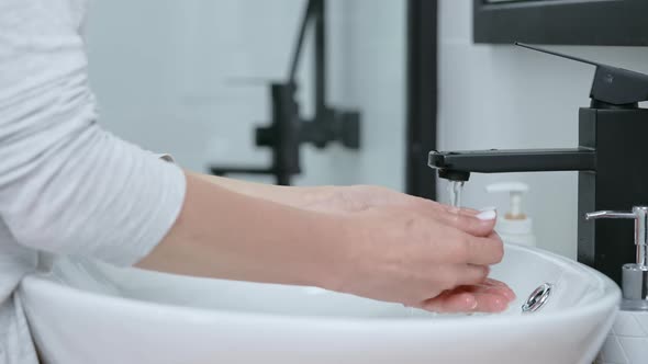 Unrecognizable Person Wash Hands