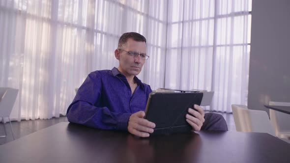 Businessman working on A Tablet