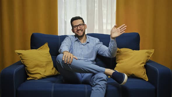 Happy Arab Man Looking at Camera Make Online Video Call at Home Smiling Talking at Webcam Recording alt