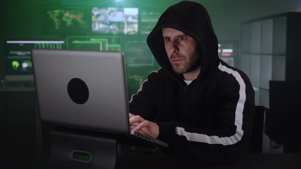 Dangerous Hooded Hackers Breaks Into Government Data Servers and Infects Their System with a Virus alt