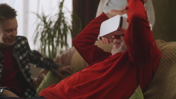 Grandfather Having Virtual Reality Experience alt