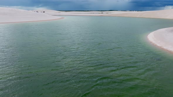 Drone Flies Over A Lagoon Of Green And Transparent Waters, Paradise In Brazil