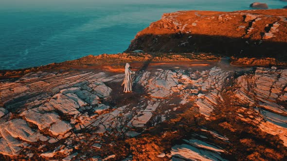 Aerial view around the Monument to King Arthur in Britain Monument close up on sea background