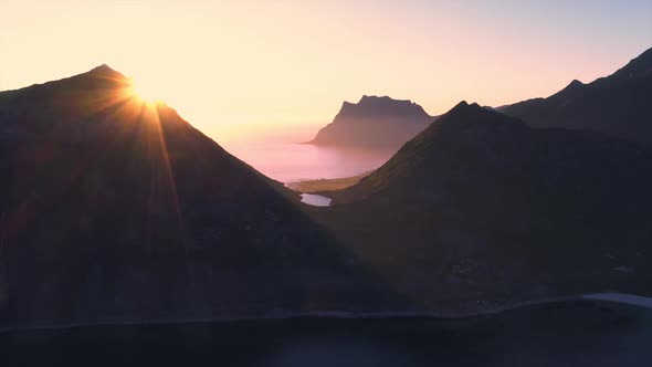 Aerial view on the mountaians at the sunset,Haukland beach and Mannen peak Lofoten island ,Norway