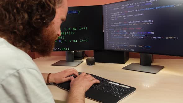 Programmer Writes Code On Computer alt