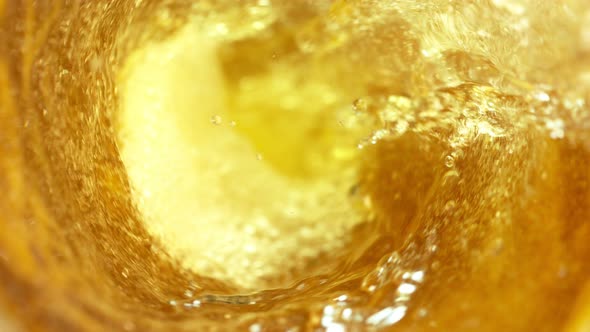 Super Slow Motion Shot of Beer Vortex at 1000 Fps. alt