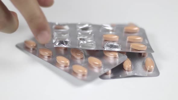 Taking Medicaments From The Table alt