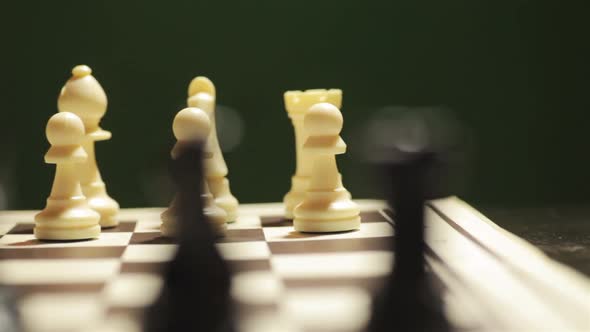 Chess board, with white pieces in focus