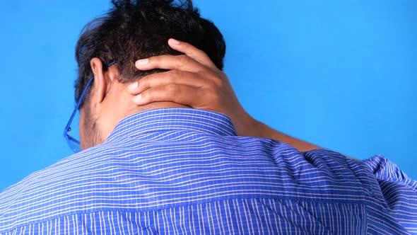 Man Suffering From Neck Pain Home alt