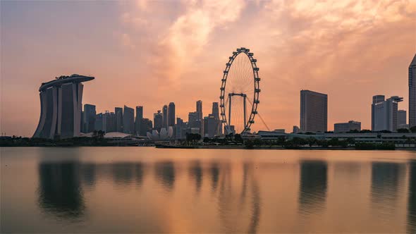 Singapore, Singapore, Timelapse  - The Singaporean skyline and its iconic wheel from Day to Night