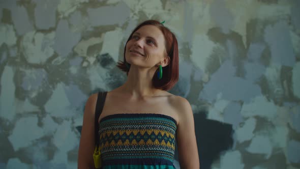 Pretty 30s Woman Is Satisfied with House Renovation, Happy Lady Dreaming of Interior alt