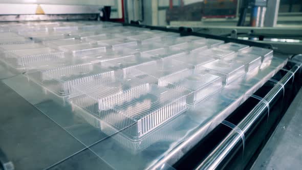 Industrial Mechanism Is Relocating Pieces of Plastic Package alt