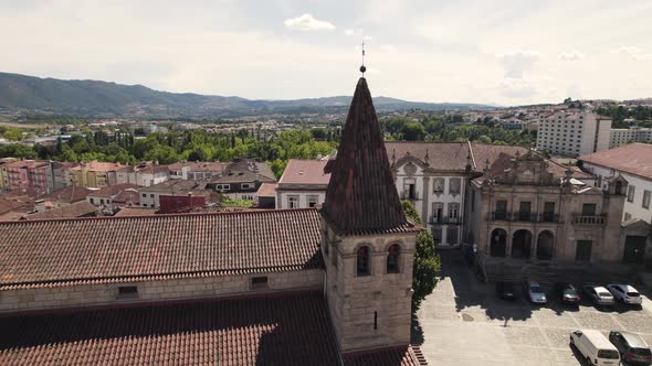 Church of Santa Maria Maior and Homage Tower of Chaves castle in background, Portugal. alt
