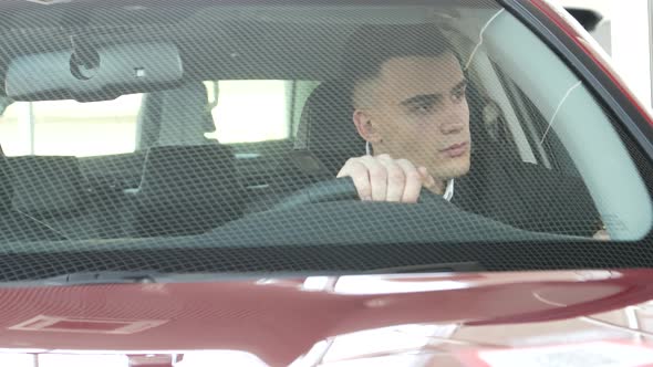 Auto business, car sales, seller with a folder in your hands alt