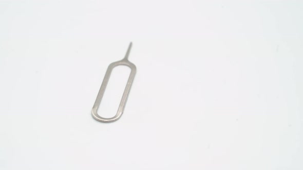 A Paper Clip for Removing a SIM Card in a Mobile Phone