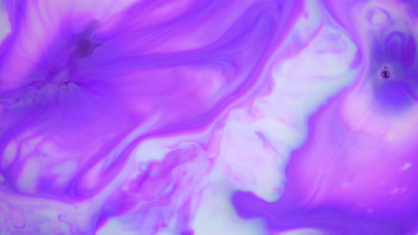 Ink in Water, Purple Ink Reacting in Water Creating Abstract Background
