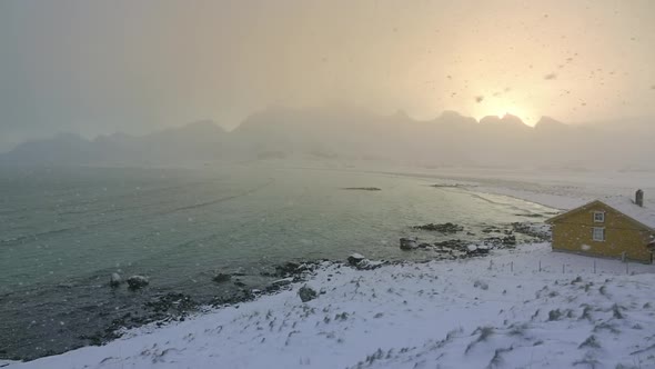 Snowfall over the Fjord and Wind
