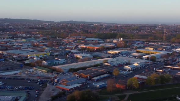 Golden hour aerial view over Marsh Barton Inductrial Estate in Exeter, UK. alt