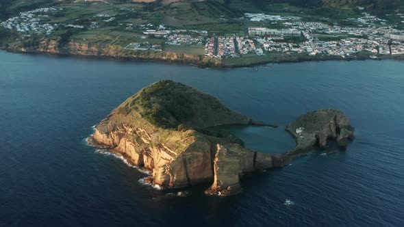 Drone Footage of the Rocky Formation Washed with the Ocean alt