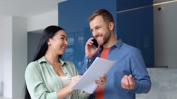 Happy Friendly Colleagues Learning Financial Document for Business Plan alt