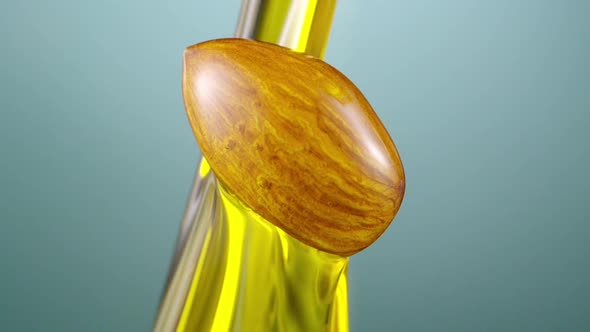 Almond oil pouring slow motion alt
