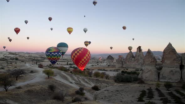Hot Air Balloons over Valley in Cappadocia, Turkey.