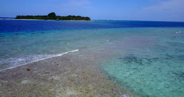 Luxury above abstract view of a sandy white paradise beach and aqua turquoise water background in hi alt