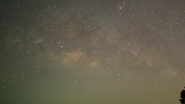 Milky Way galaxy exploration through outer space towards glowing milky way galaxy. 4K looping animat alt