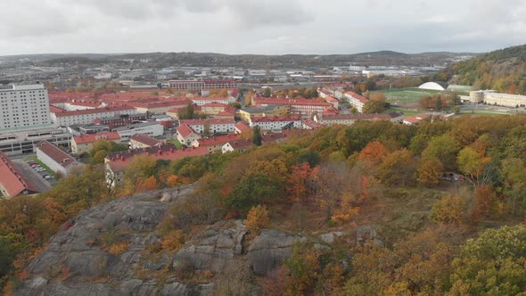 Bunkeberg Mountain and Gamlestaden Gothenburg Autumn Foliage Aerial Forward alt