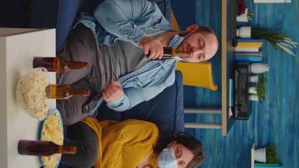 Vertical Video Multiethnic Friends Looking at Tv Relaxing Spending Time Together alt