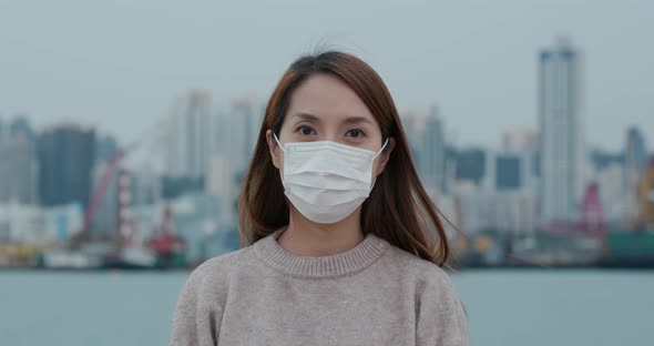 Woman wearing face mask in city
