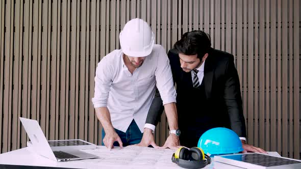 power and environment, architect examining efficiency of energy and innovation of project alt