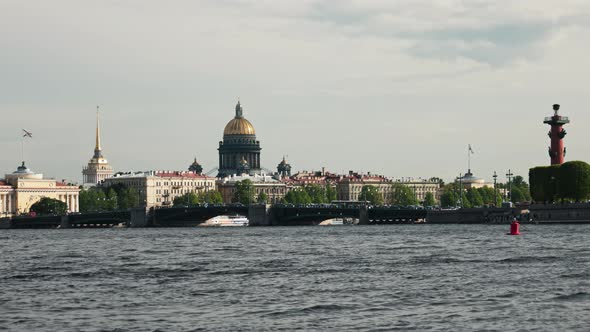 view of the beautiful old town of St. Petersburg, St. Isaac's Cathedral, water waves of the Neva Riv alt