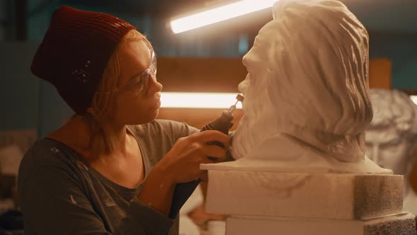 Woman Working in Sculpting Workshop alt