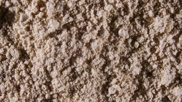 Motion of the Dry Mask Made of Clay Powder Cosmetic Texture with Rotation alt