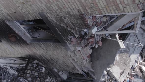 Vertical Video of a Residential Building Destroyed By the War in Ukraine alt