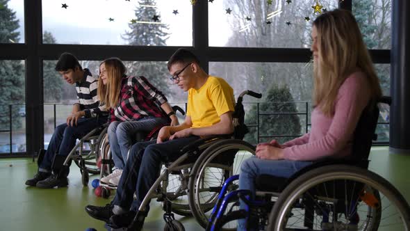 Happy Disabled People Playing Boccia Game Indoors alt